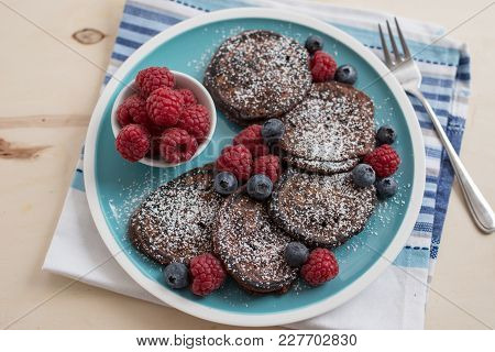 Home Made Chocolate Pancakes With  Fresh Raspeberries