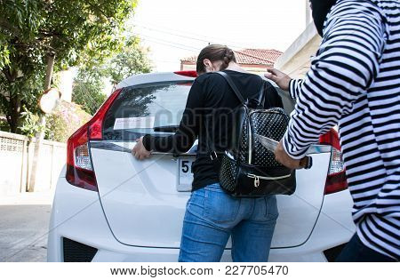 Male Robber Robbing A Lady Handbag Threatening With Knife To Young Woman,criminal Concept