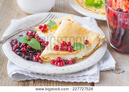 Pancakes With Cream Cheese And Lingonberries And Tea