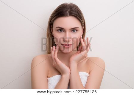 Smooth Skin Is Half The Battle! Close Up Studio Portrait Of The Young Fair-faced Relaxed Woman With 