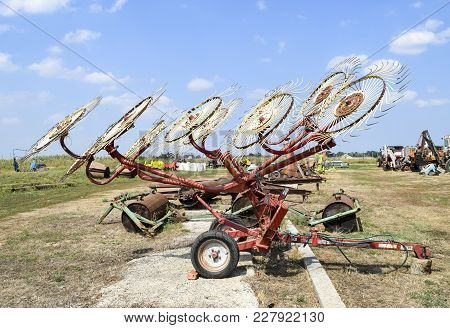 Tedder On Trailer For Tractor. The Machine For Gathering Hay.
