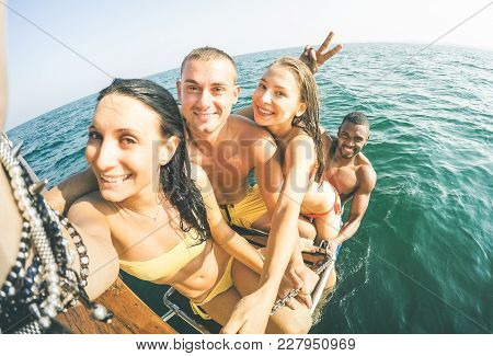 Young Multiethnic Friends Taking Selfie After Swimming On Sailing Boat Sea Trip - Rich Happy Guys An