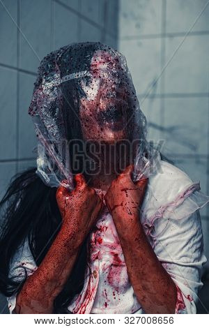 Horror Scence Of Woman Cover The Plastic Bag In Head In Toilet
 At Abandoned House.ghost Women Wear 