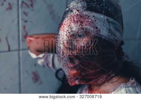 Horror Scence Of Woman Cover The Plastic Bag In Head In Toilet
 At Abandoned House.ghost Women Wear 