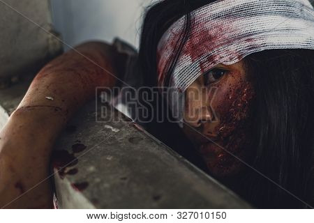 Horror Scence Face Of Women With Blood. Ghost Women Wear White Dress Stain Blood At Abandoned House
