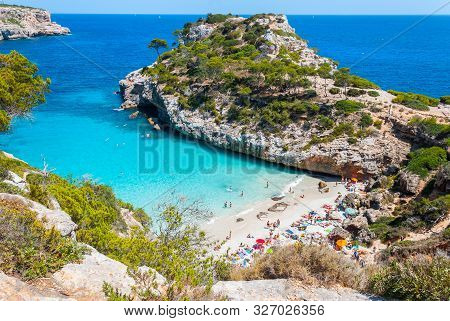 Calo Des Moro, Mallorca On A Sunny Day With People On The Beach