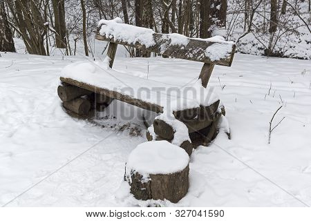 Winter Landscape. Snow-covered Bench In The Forest. Bitsa Park, Moscow, Russia. December.