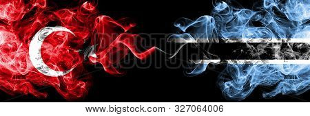 Turkey Vs Botswana, Botswanan Smoke Flags Placed Side By Side. Thick Colored Silky Smoke Flags Of Tu