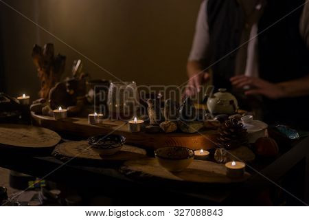 Man Playing Tank Drum Or Hang At Home. Warm Romantic Illumination, Low Key. Relaxation, Meditative A