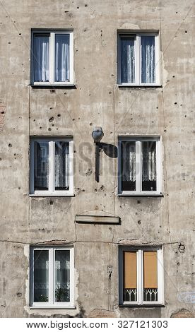 Old Tenement In Capital Of Poland Warsaw In Praga District With Second World War Marks Of Shots On I