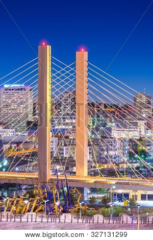 Tacoma, Washington, USA cityscape with East 21st Street Bridge at night.