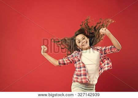 Going To Prom. Cute Small Girl With Wavy Prom Hairstyle On Red Background. Adorable Little Child Wit