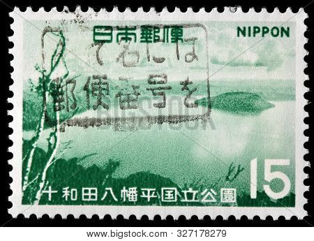 Luga, Russia - September 20, 2019: A Stamp Printed By Japan Shows Lake Towada - The Largest Crater L
