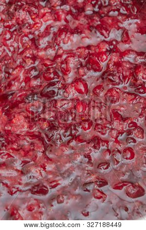 Crushed Red Cranberry Filled With Alcohol Before Cooking Tinctures