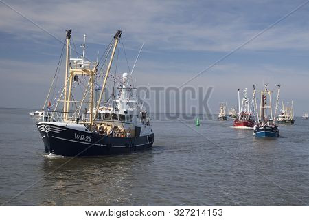 Den Oever, The Netherlands - Augustus 28, 2018: People On Board A Fishing Vessel Fishing Day Event  
