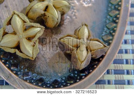 Sacha Inchi Peanuts Or Inca Seeds On A Tray. Sacha Inchi Has Cosmetic Qualities.