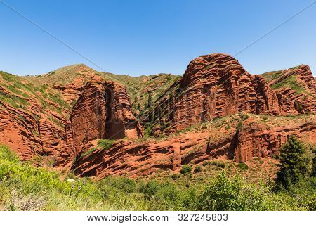 Seven Bulls Jeti Ogyz Valley Red Sandstone Formation In Kyrgyzstan