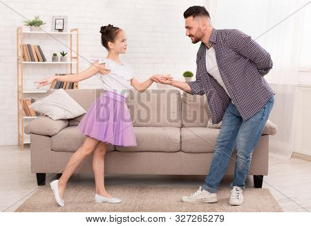 Little Girl Dancing With Father, Feeling Like Little Princess At Home
