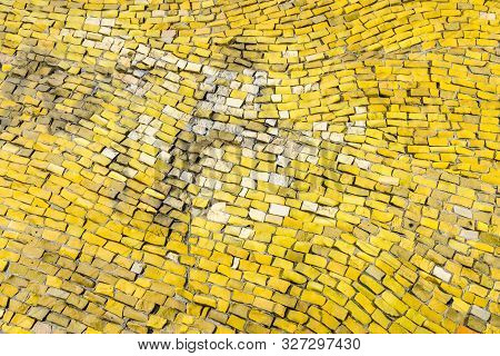 Smalt Yellow Surface, Old Crumbling Abstract Decorative Mosaic As Background. Multicolored Ceramic S