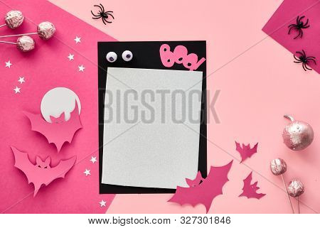 Creative Paper Craft Halloween Flat Lay In Pink And Black. Top View With Cipy-space On Stack Of Card