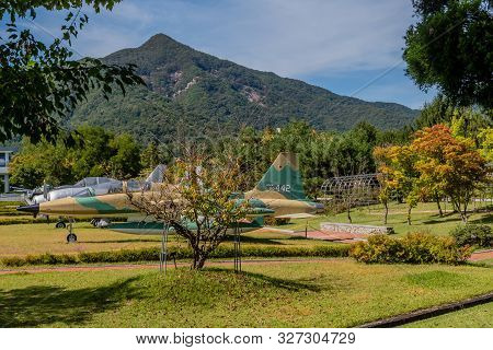 Daejeon, South Korea; October 9, 2019: Row Of Military Aircraft Used In The Korean War On Display At