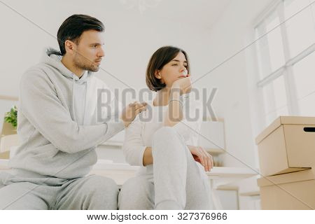 Caring Husband Tries To Calm Wife In Difficult Life Situation, Relocate In New House For Living, Pos