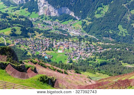 Aerial View Of The Village Of Lauterbrunnen From The Mountain Mannlichen. Switzerland.