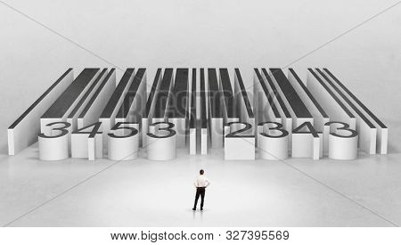 Young businessman standing in front of a big codebar