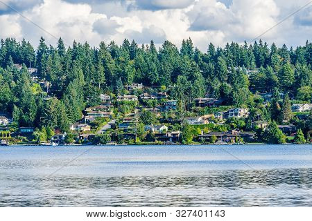 Billowing Clouds Hover Over Mercer Island In Washington State.