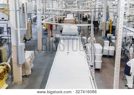 Work In The Workshop Of A Modern Automated Confectionery Factory With Conveyor Lines