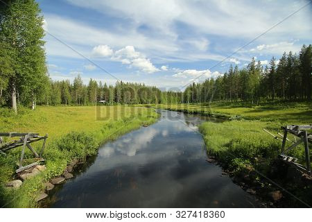 Beautiful View On Stream Petikan In The Rortrask Silanger Culture Reserve In Lapland.