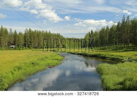 Beautiful View On Stream Petikan In The Rortrask Silanger Culture Reserve In Lapland.