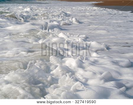 Foam And Waves In The Sea, Sunny Day. Waves Crushing For Background And Desktop. Sandy Beach.text Bo