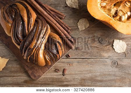 Cinnamon Babka Or Brioche Bread. Pumpkin Swirl Bread, Seasonal Autumnal Pastry For Holiday Breakfast