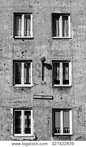Monochrome Image Of Old Tenement In Capital Of Poland Warsaw In Praga District With Second World War