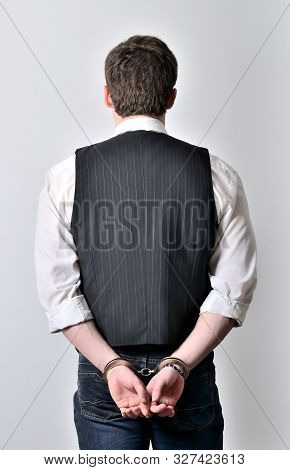 Arrested Manager In Jacket And Shirt Isolated On White Background - Vertical Photo