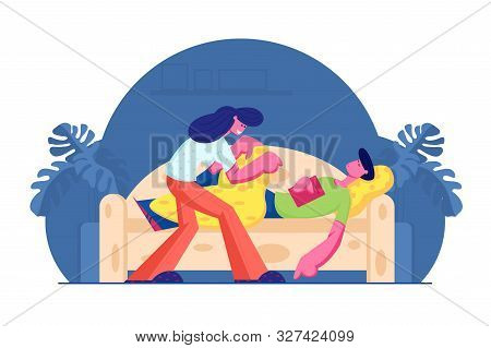 Young Woman Covering With Blanket And Care Of Man Sleeping With Book In Hands On Sofa. Happy Family 