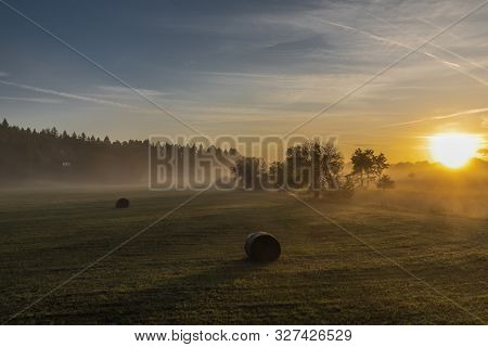 Color Sunrise With Fog On Meadows Near Pisek Town In South Bohemia