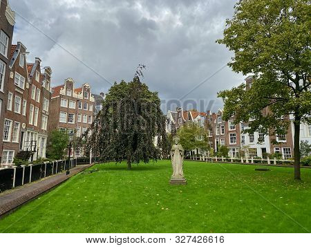 The Begijnhof Is One Of The Oldest Hofjes In Amsterdam. A Group Of Historic Buildings, Mostly Privat
