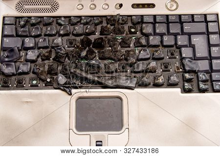 Melted Laptop Keyboard, Short Circuit, Fire Hazardous Office Equipment