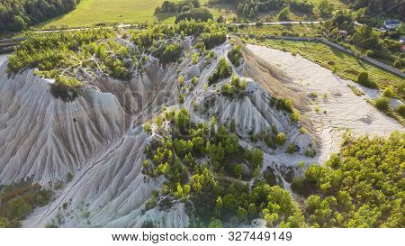Sand Hills Of Quarry With A Pond And Abandoned Prison In Rummu Estonia Europe. Flooded Houses Of For
