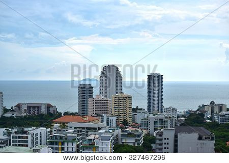 On The Condo Looking Out Over The Buildings, Buildings And Hotels. See The Beautiful Sky On A Holida