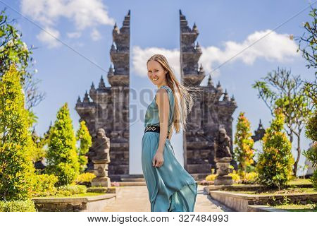 Young Woman Tourist In Budhist Temple Brahma Vihara Arama Banjar Bali, Indonesia