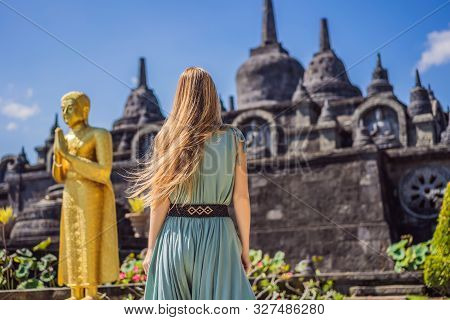 Young Woman Tourist In Budhist Temple Brahma Vihara Arama Banjar Bali, Indonesia