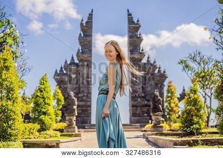 Young Woman Tourist In Budhist Temple Brahma Vihara Arama Banjar Bali, Indonesia