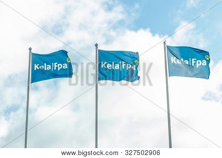 Kouvola, Finland - 22 September 2019: Flags Of Kela. Kela Is Finnish Social Insurance Institution.
