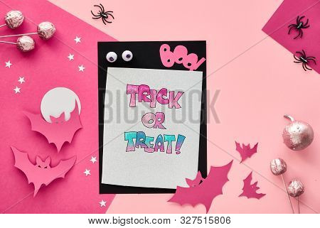 Creative Paper Craft Halloween Flat Lay In Pink And Black. Top View With Cipy-space On Stack Of Card