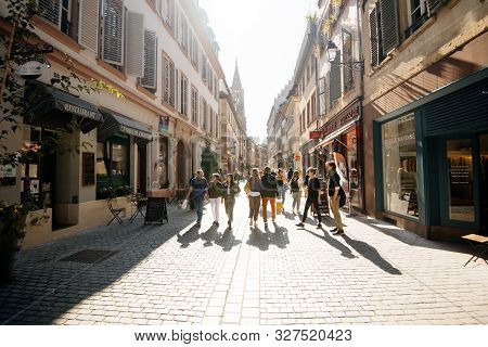 Strasbourg, France - Sep 21, 2019: Street View Cityscape Of Rue Des Juifs Street With Shops People R