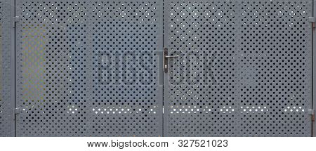 Panorama Of Metallic Gates With Round Openings