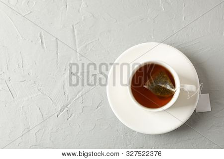 Cup Of Tea With Tea Bag On Grey Background, Top View